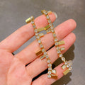 FENDI FF LOGO DROP GOLD DIAMOND EARRINGS