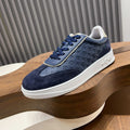 Louis Vuitton Embossed Low-Top Sneakers - Contrast Stitching