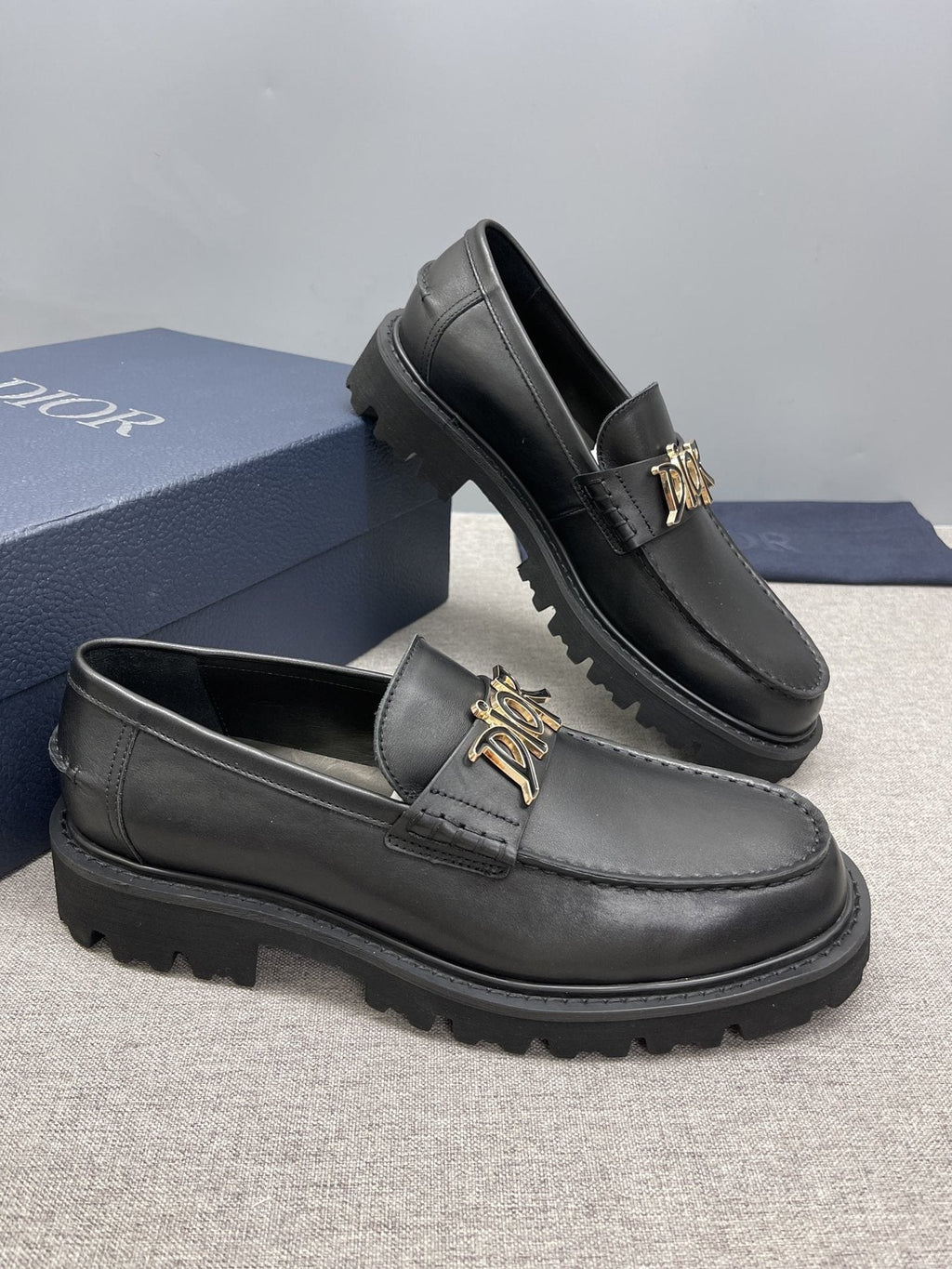 Dior Men's Black Gold-Plaque Slip-On Shoes